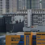 Mezzanine Storage - A city skyline with many buildings and a large building