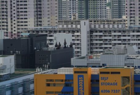 Mezzanine Storage - A city skyline with many buildings and a large building