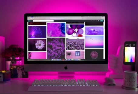 Workspace Lighting - Silver Imac Displaying Collage Photos