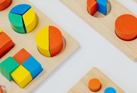 Nursery Playroom - Close-up Shot of Colorful Shapes on the White Table