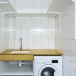 Laundry Area - Laundry Area with White Tiled Walls