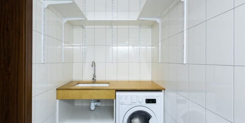 Laundry Area - Laundry Area with White Tiled Walls