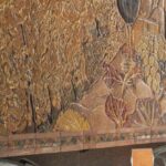 Stackable Chairs Tables - A mural on the wall of a restaurant