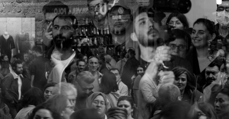 Double-Glazing Windows - A black and white photo of people in a crowd