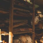 Multifunctional Storage - A small hut with a wood stove and a pile of wood