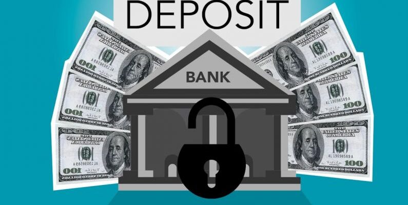 Storage Units - Decorative cardboard illustration of lock on bank with American paper money under Deposit inscription on blue background