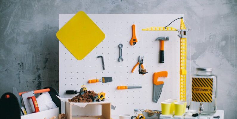 Pegboard - Plastic Toys on a Pegboard