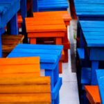 Multi-Purpose Furniture - Close-up of Colorful, Wooden Tables and Chairs