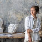 Textured Walls - Sculptor Posing in a Studio