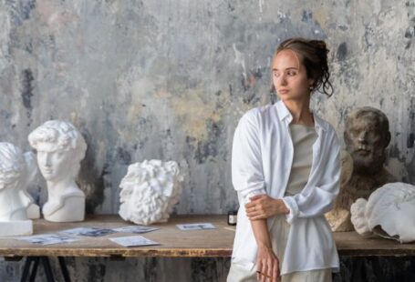 Textured Walls - Sculptor Posing in a Studio