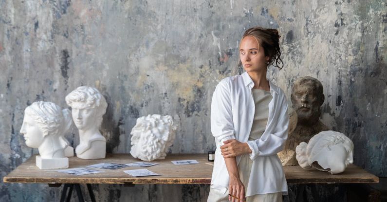 Textured Walls - Sculptor Posing in a Studio