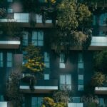 Balcony Design - Modern residential building facade decorated with green plants