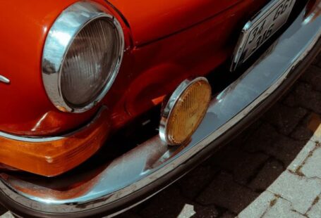 Compact Cookware - A red car parked on a brick walkway