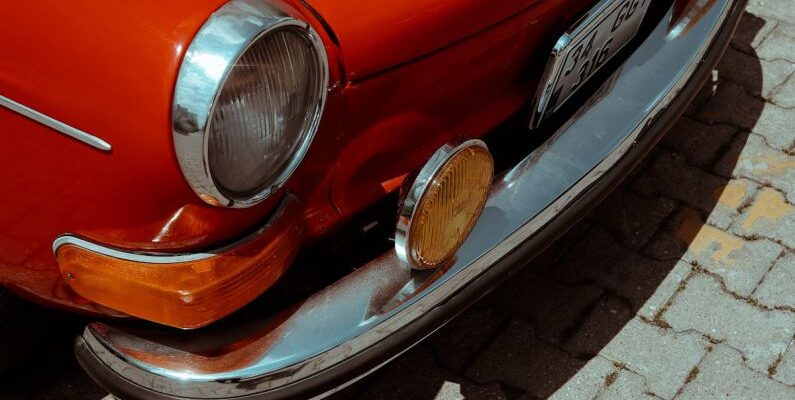 Compact Cookware - A red car parked on a brick walkway