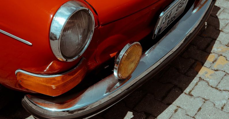 Compact Cookware - A red car parked on a brick walkway