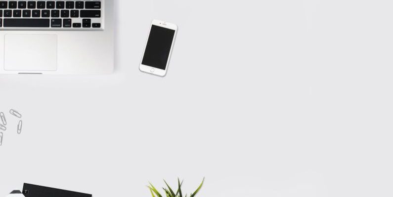 Workspace - White Smartphone Beside Silver Laptop Computer