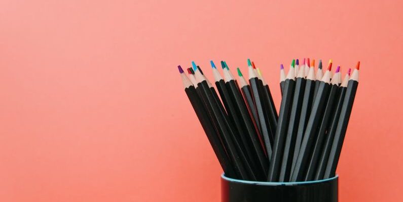 Space-Saving Tips - Colored Pencils on Black Ceramic Cup