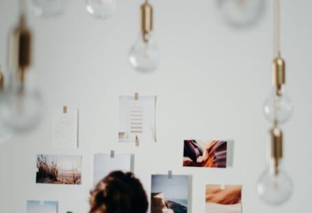 Pendant Lights - Woman Wearing White Blouse Looking on Photos