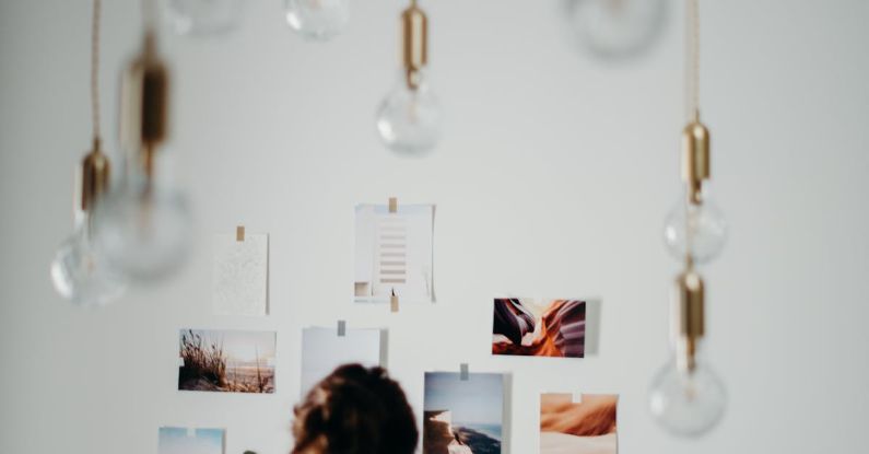 Pendant Lights - Woman Wearing White Blouse Looking on Photos
