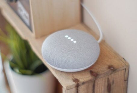 Home Automation - Round Grey Speaker On Brown Board