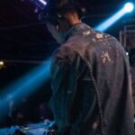Voice-Controlled Lighting - DJ with His Equipment