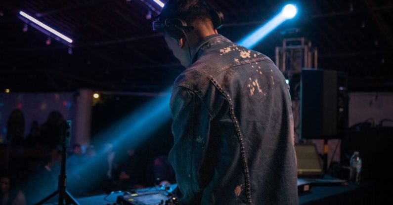 Voice-Controlled Lighting - DJ with His Equipment